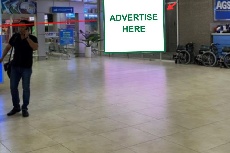 1 Bảng ốp tường trên hai cửa đi ra hành khách ga đến quốc nội, sân bay Cam Ranh