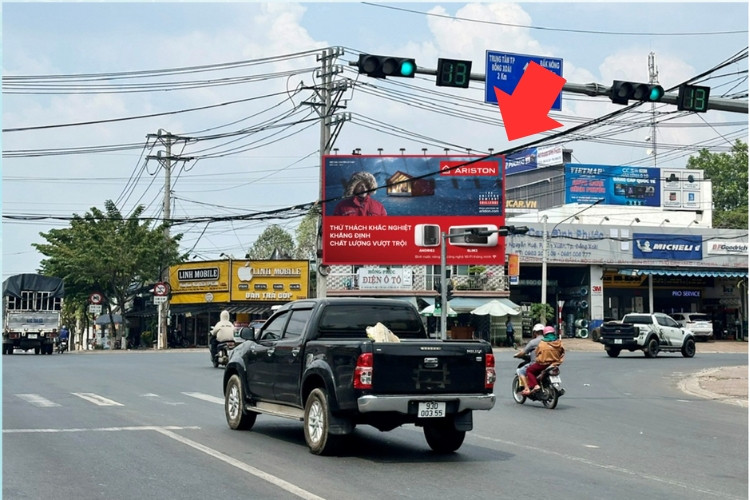 1 bảng quảng cáo treo tường nằm ngang tại số 1 đường Nguyễn Huệ, phường Bình Phước, Đồng Nai